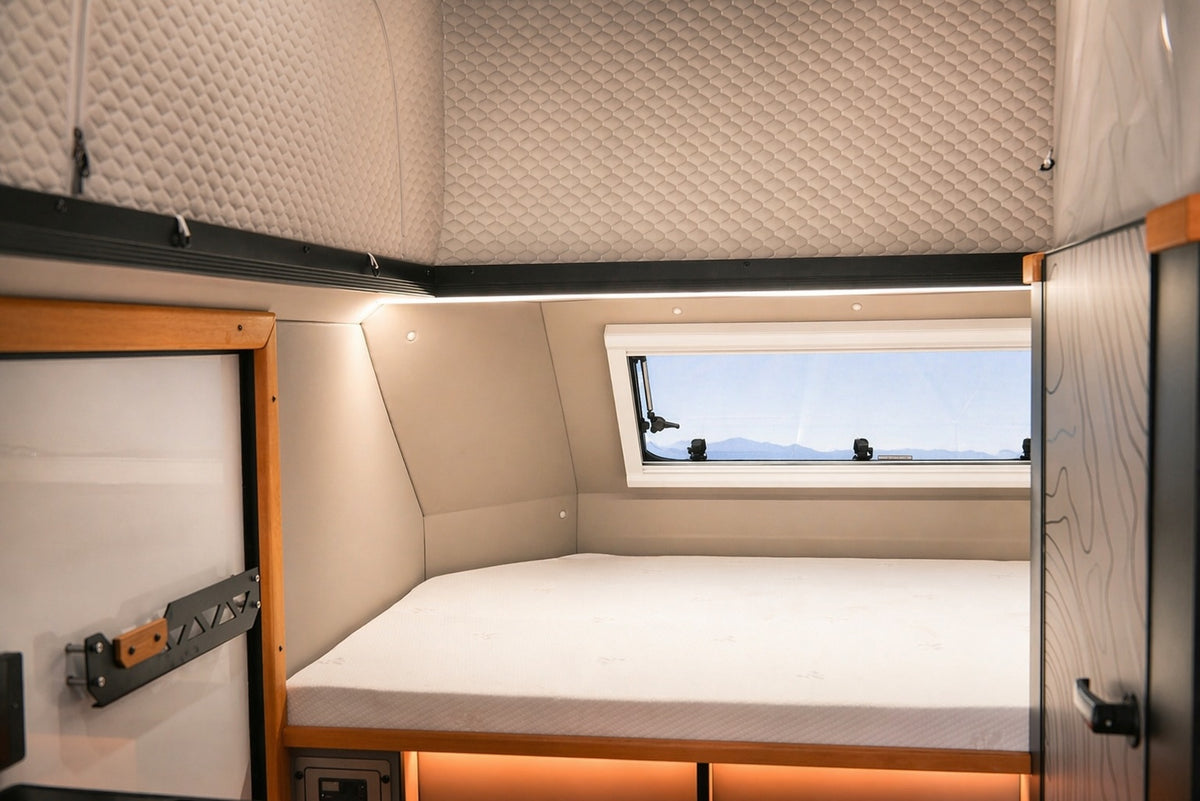 Wild Fort caravan front double bed